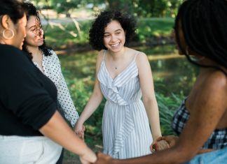 A group of women supporting each other