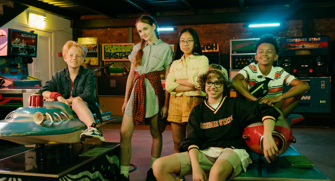 Image: Teenagers hanging out at the arcade
