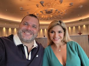Image: A husband and wife enjoying dinner at The Miami Beach EDITION