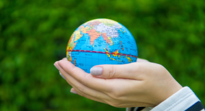 Image: Hands holding a miniature globe