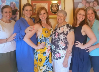Image: A group of mothers and daughters