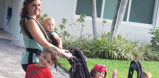 Surviving Summer: A Mother’s Guide Image: A mom out for a walk with 4 kids