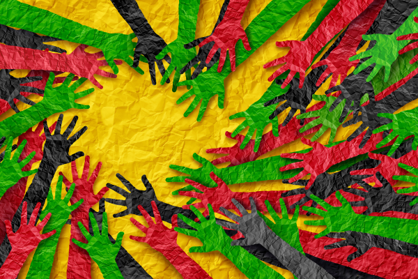 Image: Art depicting green, black, and red hands reaching toward each other on a yellow background