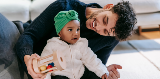 Men’s Health: Supporting the Men in our Lives | MOM STRONG Image: A dad plays with his toddler-aged daughter