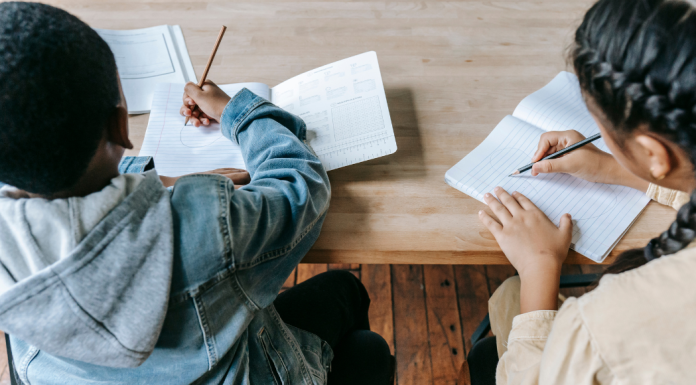 Image: Two classmates hard at work at school