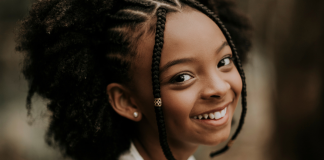 Image: A little girl shows off her smile