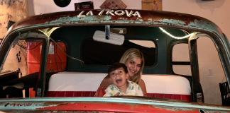 Image: A mother and son at Cafe la Trova, a local Cuban restaurant in Miami