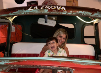 Image: A mother and son at Cafe la Trova, a local Cuban restaurant in Miami