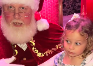 Image: Santa affirms a little girl with a message about consent after she says "No" to sitting on his lap in a TikTok video that went viral