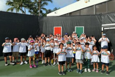 Image: Campers at Hurricane Tennis Camp pose for a group photo