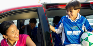 Image: A mom drops her son off at sports practice
