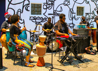 Liberty and Justice for All: Why Should I Care About Juneteenth? Image: A group of musicians performs at a Juneteenth celebration