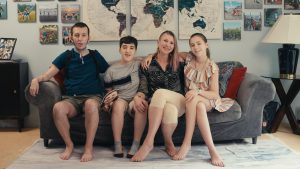 Image: Liz Naylor, Patient Ally & Director of Community Engagement of Pediatric Peds, pictured with three of her chiildren