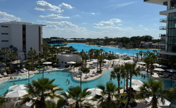 Image: A balcony view of the pool and lagoon at Conrad Orlando