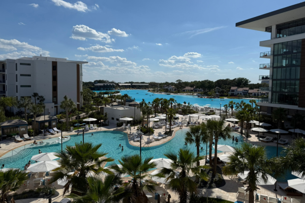 Image: A balcony view of the pool and lagoon at Conrad Orlando