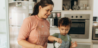 Image: Mom and child share the family tradition of cooking together