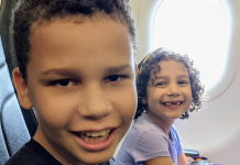 Reflections of a Semi-Retired Tooth Fairy: 4 Things I’ve Learned Image: Two kids smiling from their seats on an airplane