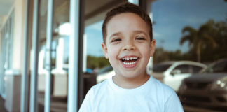 Dental Hygiene: 5 Tips From Dr. Bob Image: A little boy with a big toothy smile