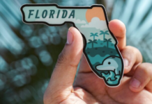 Spring Break Trips: 5 Getaways Near Miami Image: A hand holds a magnet shaped like the state of Florida