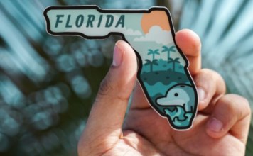 Spring Break Trips: 5 Getaways Near Miami Image: A hand holds a magnet shaped like the state of Florida