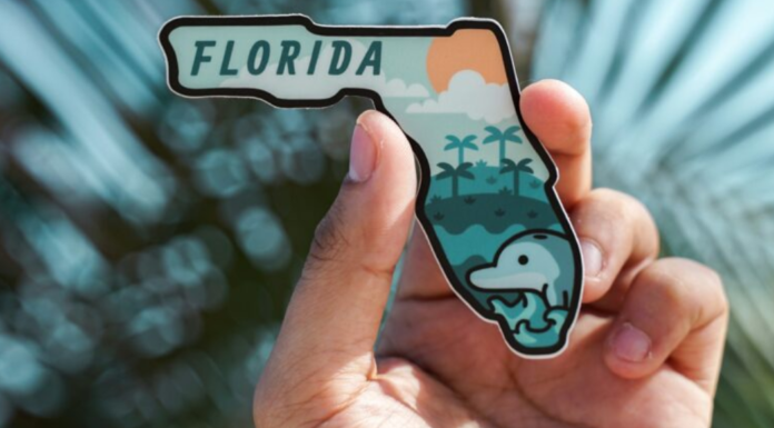 Spring Break Trips: 5 Getaways Near Miami Image: A hand holds a magnet shaped like the state of Florida