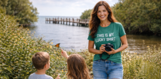 Mom and two children exploring nature at Deering Estate in Miami during spring, watching a butterfly near the waterfront.